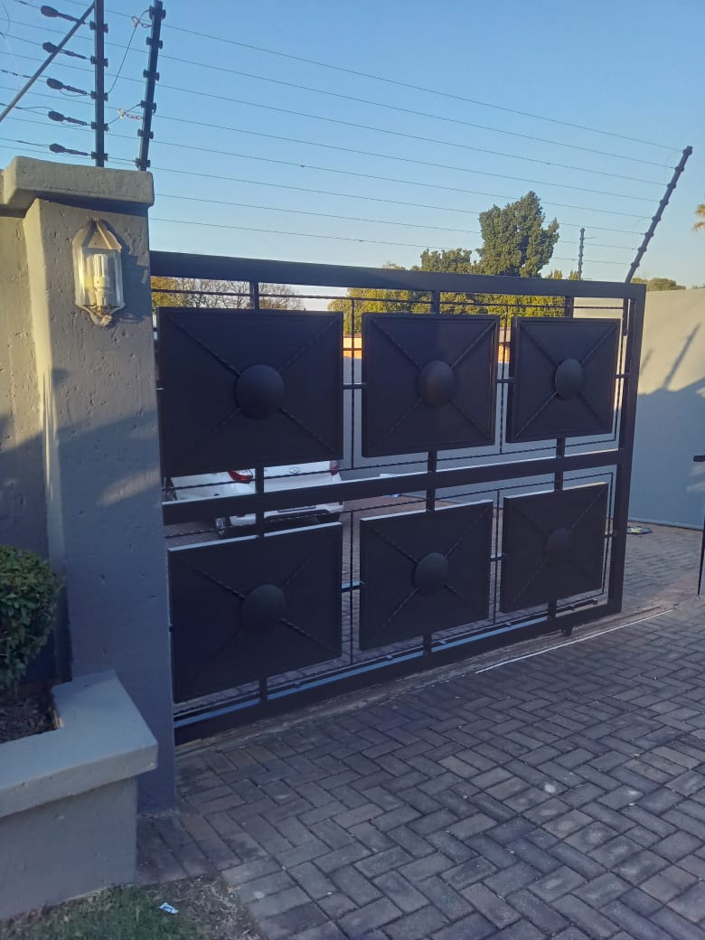 Sinqobile Construction Gate and concrete installation by Sinqobile Construction in Sandton, Gauteng - Professional construction work
