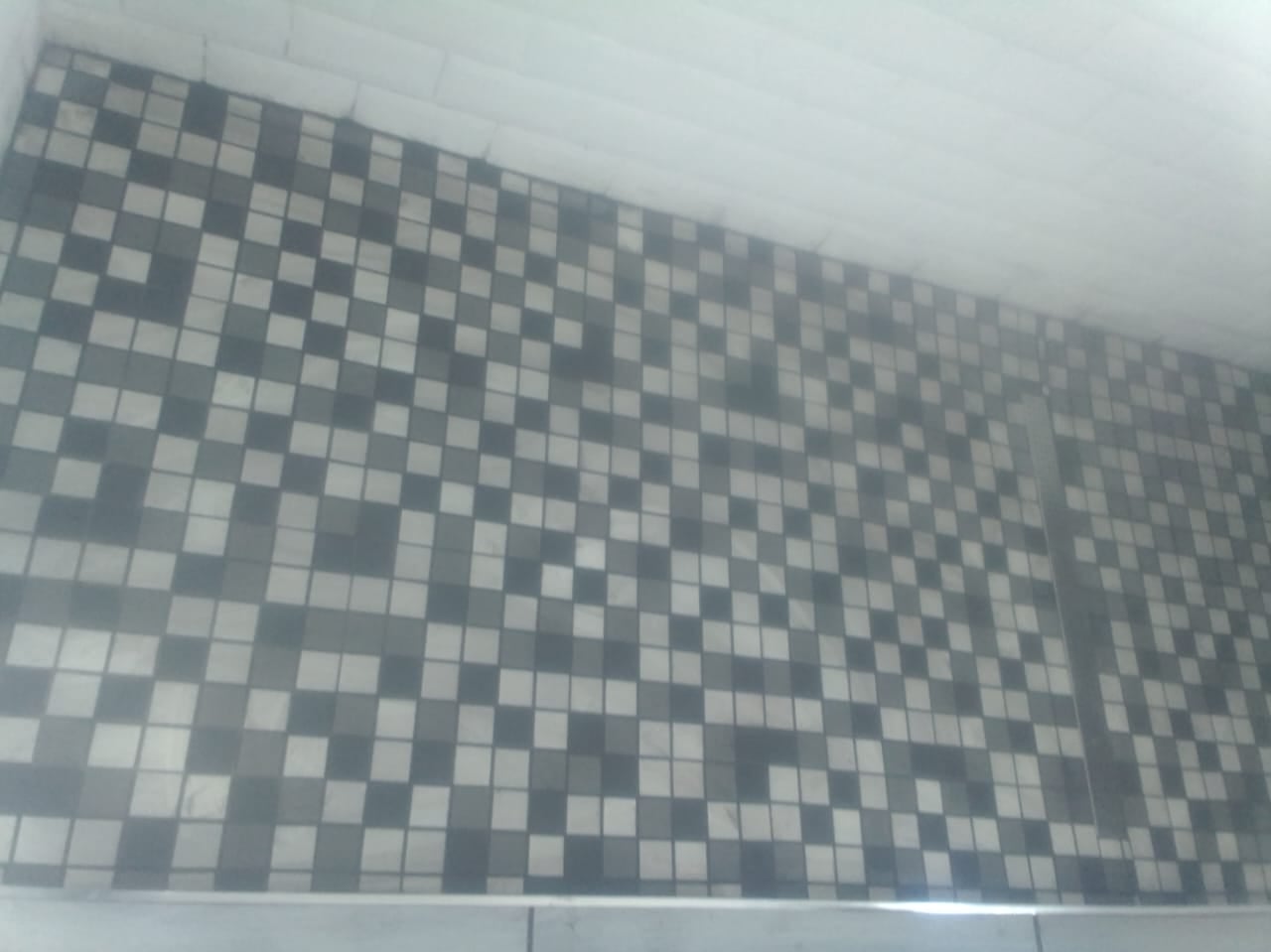 Sinqobile Construction Bathroom wall tiling by Sinqobile Construction in Fourways - Professional construction work