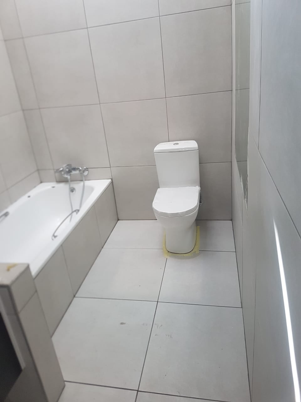 Sinqobile Construction Bathroom tiling service by Sinqobile Construction in Sandton - Professional construction work