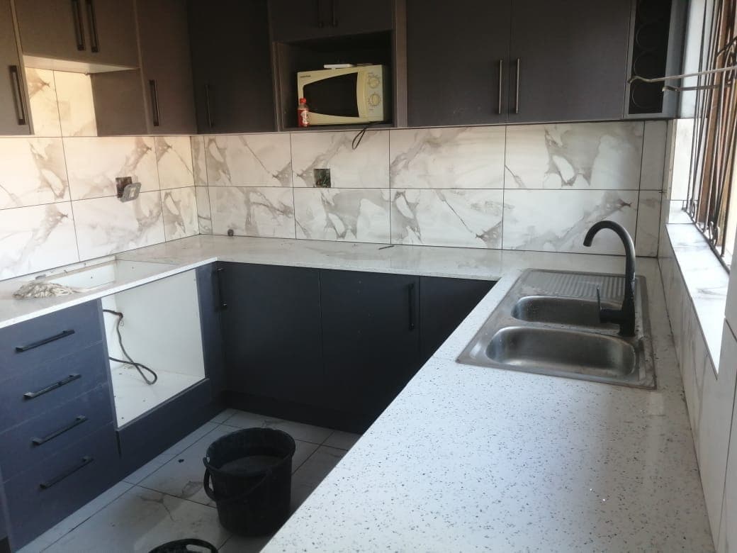 Sinqobile Construction Kitchen installation project in Soweto - Professional construction work