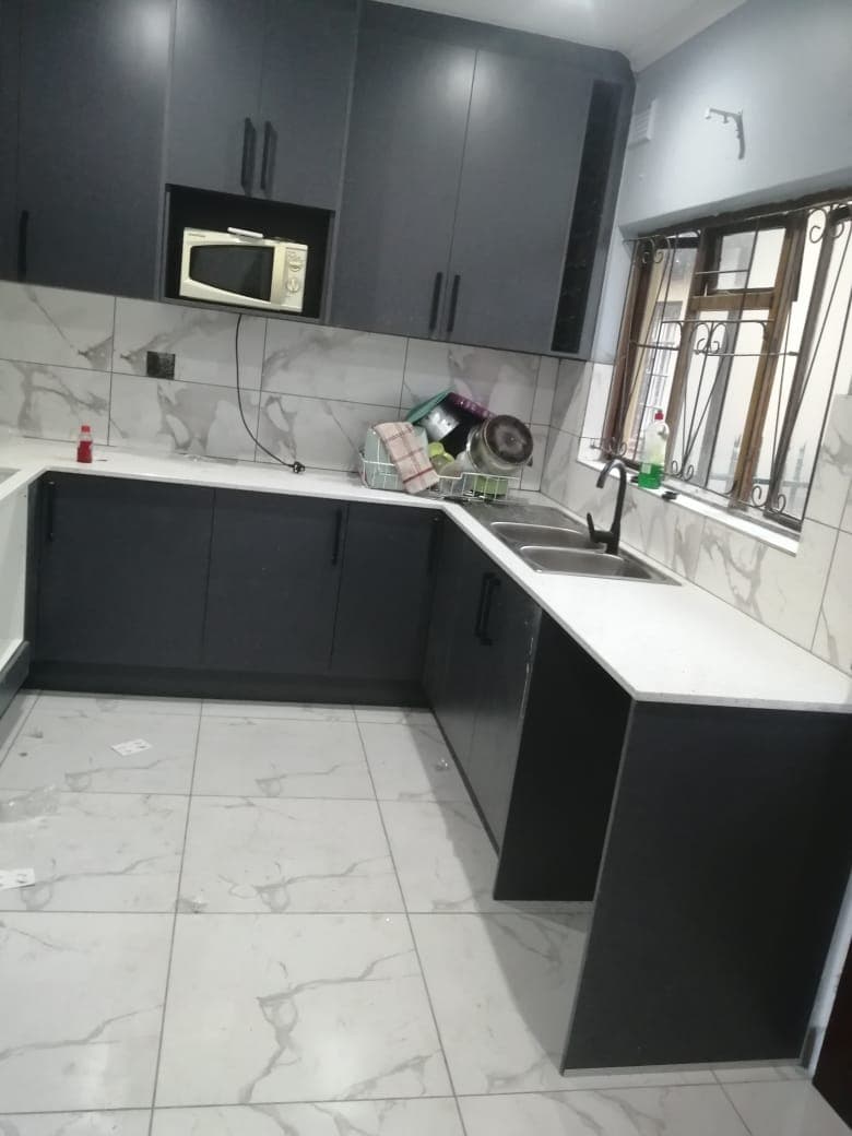 Sinqobile Construction Modern kitchen renovation in Alberton - Professional construction work